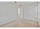Bright bedroom with double door closet and access to upper hallway at 2620 Sand Arbor Cir, Orlando, FL 32824
