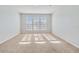 Bedroom with three arched windows and neutral wall color at 2620 Sand Arbor Cir, Orlando, FL 32824