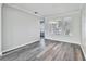 Bright dining room with hardwood floors and large windows at 2620 Sand Arbor Cir, Orlando, FL 32824