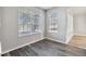 Bright dining room with hardwood floors and large windows at 2620 Sand Arbor Cir, Orlando, FL 32824
