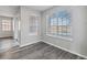 Bright dining room with hardwood floors and large windows at 2620 Sand Arbor Cir, Orlando, FL 32824