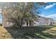 Two-story house with backyard and patio at 2620 Sand Arbor Cir, Orlando, FL 32824
