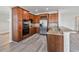 Kitchen with stainless steel appliances and wood cabinets at 2620 Sand Arbor Cir, Orlando, FL 32824