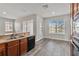 Kitchen with stainless steel appliances and wood cabinets at 2620 Sand Arbor Cir, Orlando, FL 32824