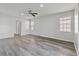 Living room with hardwood floors and ceiling fan at 2620 Sand Arbor Cir, Orlando, FL 32824