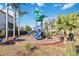 Community playground with slides and climbing structures at 2620 Sand Arbor Cir, Orlando, FL 32824