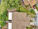 Aerial view of the property showing roofline and landscaping at 2682 Orange Peel Ct, Orlando, FL 32806