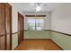 Bedroom with wood floors and double closets at 2682 Orange Peel Ct, Orlando, FL 32806