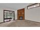 Living room features a fireplace, screened porch access, and a view of the backyard at 2682 Orange Peel Ct, Orlando, FL 32806