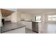 Modern kitchen with island and stainless steel appliances at 2723 Sunkissed Dr, St Cloud, FL 34771