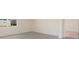 Unfurnished living room, features large windows and tile flooring at 2723 Sunkissed Dr, St Cloud, FL 34771