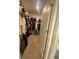 Spacious walk-in closet with ample storage solutions and an adjacent water closet at 2723 Sunkissed Dr, St Cloud, FL 34771