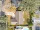 House with surrounding yard, driveway, and trees at 1116 Fairway Dr, Winter Park, FL 32792