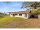 Spacious backyard, grassy area, and storage shed at 1116 Fairway Dr, Winter Park, FL 32792