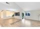 Open concept dining room with access to the kitchen and patio at 1116 Fairway Dr, Winter Park, FL 32792