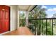 Relaxing outdoor balcony with tile flooring and black metal railing, perfect for enjoying the surrounding views at 3032 Parkway Blvd # 302, Kissimmee, FL 34747