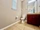 Cozy bathroom featuring vanity with storage and neutral paint at 7128 Five Oaks Dr, Harmony, FL 34773