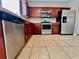 Modern kitchen featuring stainless steel appliances and plenty of cabinetry at 7128 Five Oaks Dr, Harmony, FL 34773