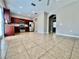 Open living space with views of modern kitchen and recessed lighting at 7128 Five Oaks Dr, Harmony, FL 34773