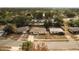 Aerial view of charming house with well-maintained yard, showcasing desirable neighborhood at 1209 Baranova Rd, Ocoee, FL 34761