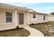 Inviting exterior featuring a front porch and landscaping at 1209 Baranova Rd, Ocoee, FL 34761