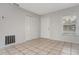 Bright living room with tile flooring and ample natural light at 1209 Baranova Rd, Ocoee, FL 34761