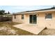 Concrete patio adjacent to the back of the house at 1209 Baranova Rd, Ocoee, FL 34761