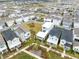 Aerial view showing homes and a neighborhood park at 13104 Markowitz Aly, Orlando, FL 32827