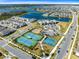 Aerial view of community amenities including tennis courts at 13104 Markowitz Aly, Orlando, FL 32827