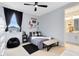 Cozy bedroom with a comfortable bed and stylish decor at 13104 Markowitz Aly, Orlando, FL 32827