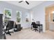 Spacious home office featuring two desks and a view into the bathroom at 13104 Markowitz Aly, Orlando, FL 32827