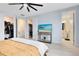 Bright bedroom with walk-in closets and ensuite bathroom at 13104 Markowitz Aly, Orlando, FL 32827