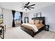 Spacious main bedroom with plush carpet and large windows at 13104 Markowitz Aly, Orlando, FL 32827