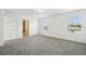 Clean bedroom features plush carpeting, and a door that leads into the walk-in closet at 2949 Wild Olive Dr, St Cloud, FL 34772