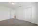 Spacious bedroom with a closet and neutral carpeting is bathed in natural light at 2949 Wild Olive Dr, St Cloud, FL 34772