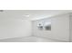 Bright bedroom with neutral walls and large windows at 2949 Wild Olive Dr, St Cloud, FL 34772
