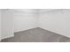 Carpeted walk-in closet with wire shelving at 2949 Wild Olive Dr, St Cloud, FL 34772