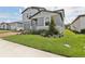 Well-maintained home exterior features a neat lawn and welcoming curb appeal at 2949 Wild Olive Dr, St Cloud, FL 34772