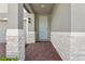 Inviting front porch featuring stone accents and a light blue front door at 2949 Wild Olive Dr, St Cloud, FL 34772