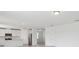 Open-concept kitchen with white cabinets and modern appliances at 2949 Wild Olive Dr, St Cloud, FL 34772