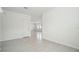 Spacious living area with tile floors, a bright, airy feel, and multiple windows at 2949 Wild Olive Dr, St Cloud, FL 34772