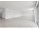 Spacious living room features tile floors, recessed lighting, and plenty of natural light at 2949 Wild Olive Dr, St Cloud, FL 34772