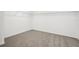 Neutral walk-in closet featuring ample storage, neutral paint, and plush carpeting at 2949 Wild Olive Dr, St Cloud, FL 34772