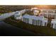Apartment community near a lake, showcasing modern architecture at 3171 Paradox Cir # 305, Kissimmee, FL 34746