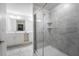 Modern bathroom with double vanity, large mirror, and walk-in shower at 3171 Paradox Cir # 305, Kissimmee, FL 34746