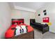 Charming bedroom with twin-size beds, Mickey Mouse bedding, and wall art at 3171 Paradox Cir # 305, Kissimmee, FL 34746
