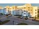 Contemporary apartment building with parking and landscaping at 3171 Paradox Cir # 305, Kissimmee, FL 34746