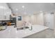 Modern kitchen with white cabinets and quartz countertops at 3171 Paradox Cir # 305, Kissimmee, FL 34746