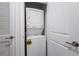Stackable washer and dryer in a convenient laundry room at 3171 Paradox Cir # 305, Kissimmee, FL 34746