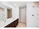 Modern bathroom with double sinks, spacious shower, and bright lighting at 1123 Union Ave, Mascotte, FL 34753